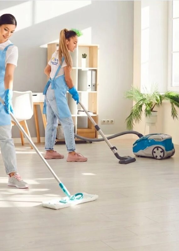 Magic Maid Cleaning team cleaning a living room