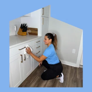 Magic Maid Cleaning team member doing standard house cleaning